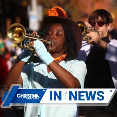  CSDintheNews Band member with horn performs in Newark's Halloween Parade